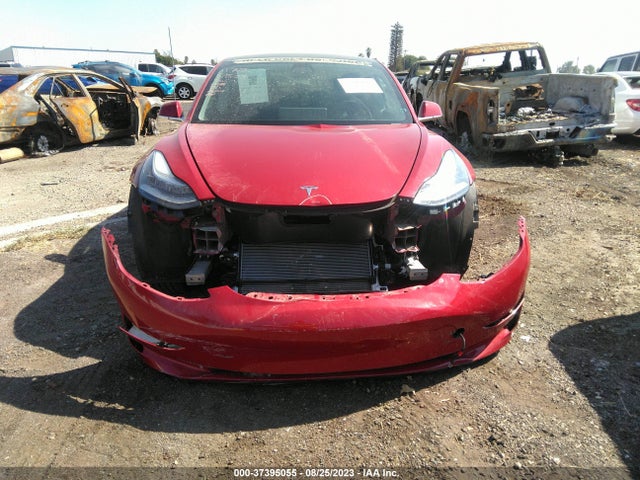 2018 Tesla 3, VIN: 5YJ3E1EA4JF163789