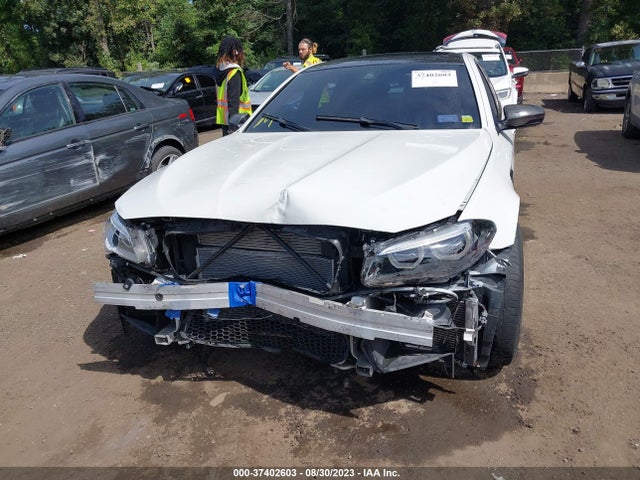 2015 BMW M5, VIN: WBSFV9C56FD594871