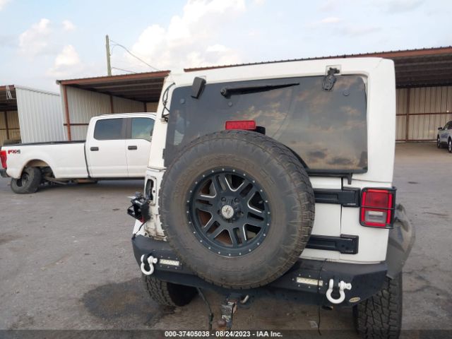 1C4BJWEG9EL238644 Jeep Wrangler Unlimited Sahara