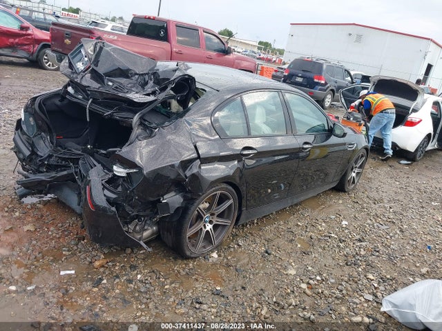 2015 BMW M5, VIN: WBSFV9C50FD594557