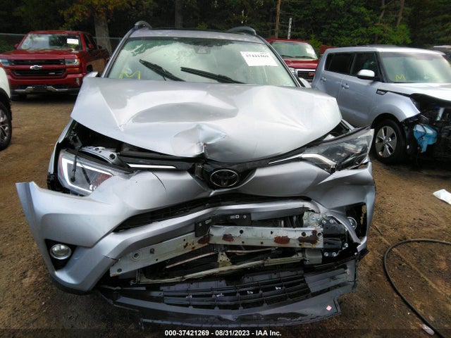 2018 TOYOTA RAV4 XLE VIN: 2T3RFREV7JW802072