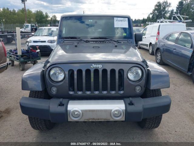 1C4GJWBG3EL225141 Jeep Wrangler Sahara