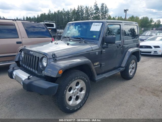1C4GJWBG3EL225141 Jeep Wrangler Sahara