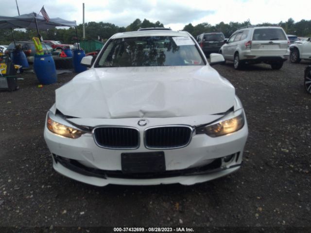 WBA3C3C5XEF986989 BMW 3 Series 320i Xdrive