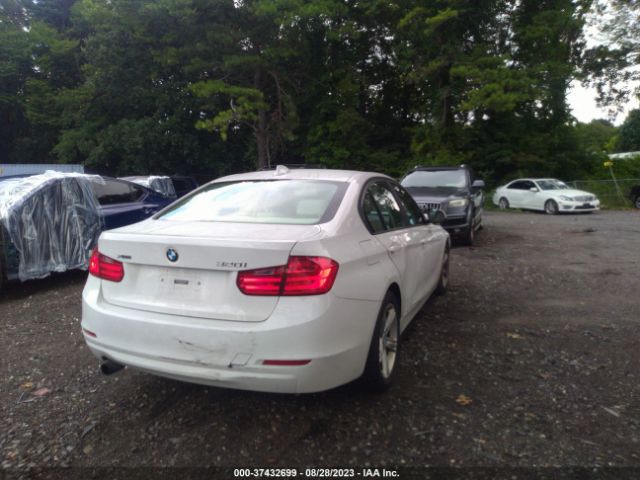 WBA3C3C5XEF986989 BMW 3 Series 320i Xdrive