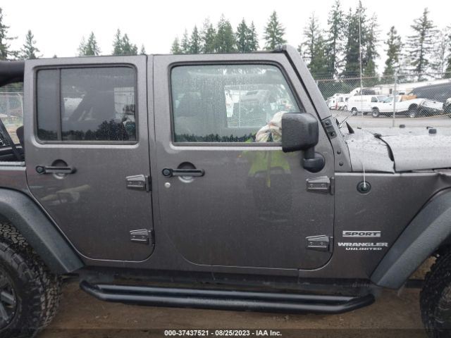 1C4BJWDG0EL258492 Jeep Wrangler Unlimited Sport