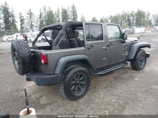 1C4BJWDG0EL258492 Jeep Wrangler Unlimited Sport