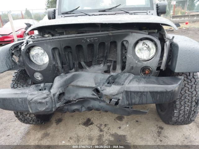 1C4BJWDG0EL258492 Jeep Wrangler Unlimited Sport