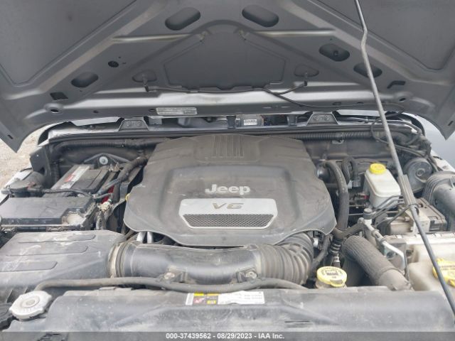 1C4BJWDG8EL170984 Jeep Wrangler Unlimited Sport