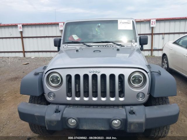 1C4BJWDG8EL170984 Jeep Wrangler Unlimited Sport