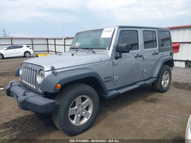 1C4BJWDG8EL170984 Jeep Wrangler Unlimited Sport