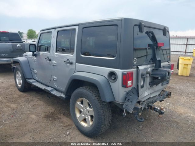 1C4BJWDG8EL170984 Jeep Wrangler Unlimited Sport