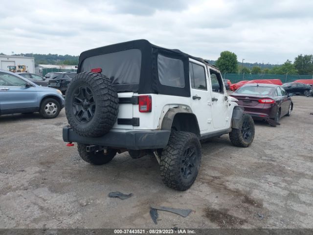 1C4BJWDG4EL207044 Jeep Wrangler Unlimited Sport