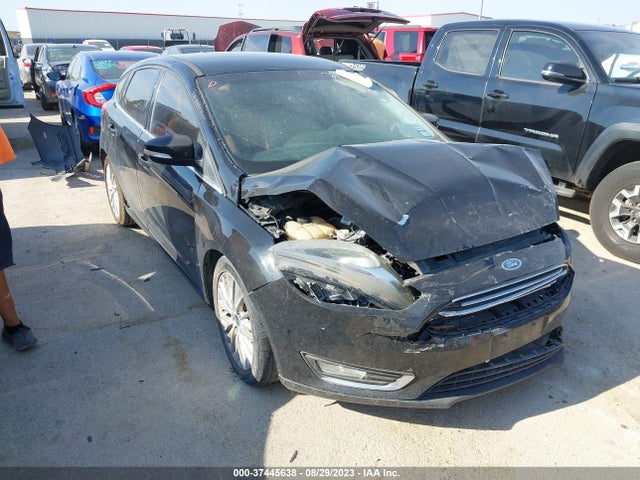 2016 FORD FOCUS TITANIUM VIN: 1FADP3N23GL302440
