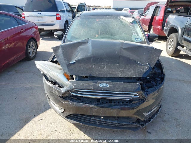 2016 FORD FOCUS TITANIUM VIN: 1FADP3N23GL302440