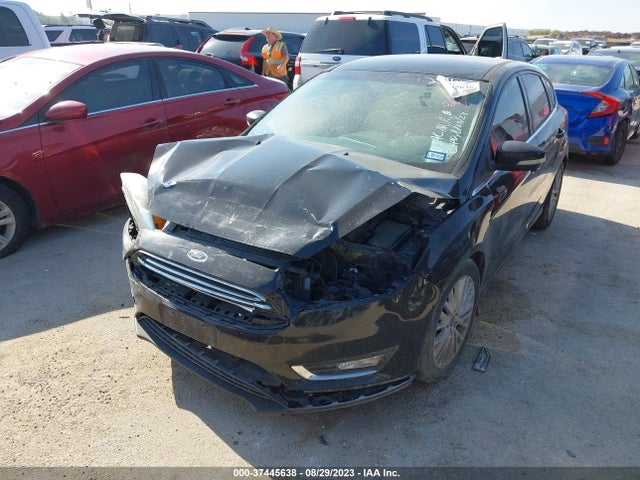 2016 FORD FOCUS TITANIUM VIN: 1FADP3N23GL302440