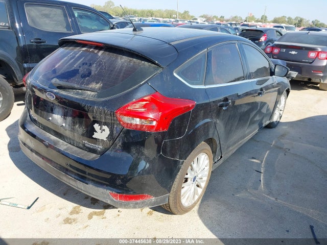 2016 FORD FOCUS TITANIUM VIN: 1FADP3N23GL302440
