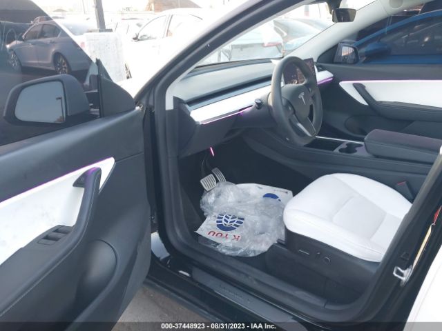7SAYGDEF7NF394580 Tesla Model Y Performance