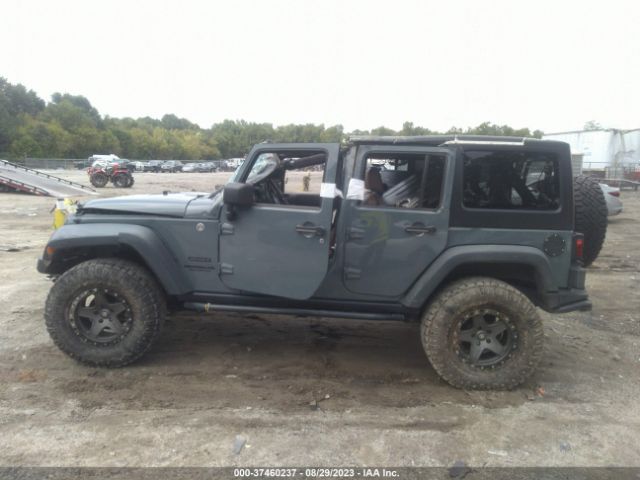 1C4BJWDGXEL218906 Jeep Wrangler Unlimited Sport