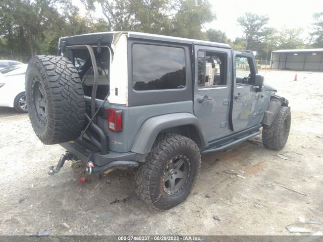 1C4BJWDGXEL218906 Jeep Wrangler Unlimited Sport