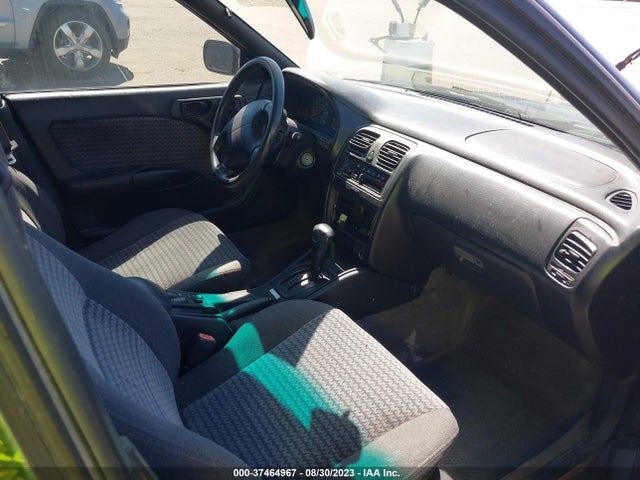 1999 SUBARU LEGACY WAGON OUTBACK VIN: 4S3BG6858X7658545