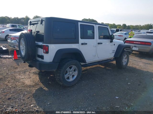 1C4BJWDGXFL635802 Jeep Wrangler Unlimited Sport