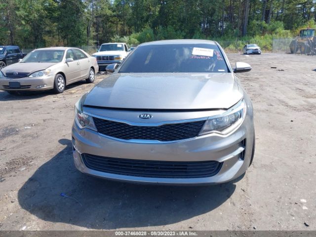 5XXGT4L37JG210324 KIA Optima Lx