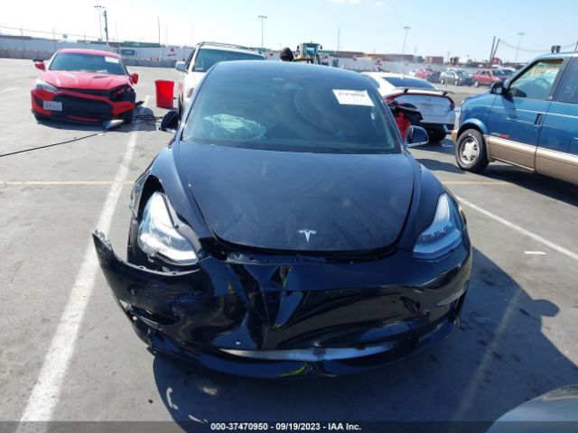 5YJ3E1EA4KF409774 Tesla Model 3 Range