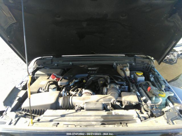 1C4HJXDG5KW504186 Jeep Wrangler Unlimited Sport S