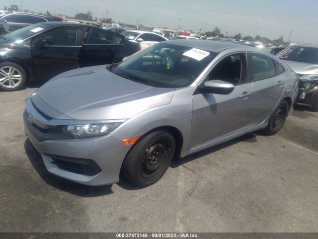 19XFC2F57JE209759 Honda Civic Sedan Lx