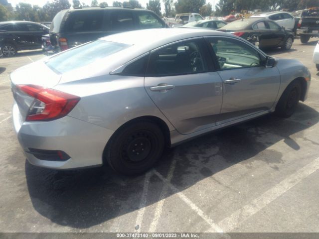 19XFC2F57JE209759 Honda Civic Sedan Lx