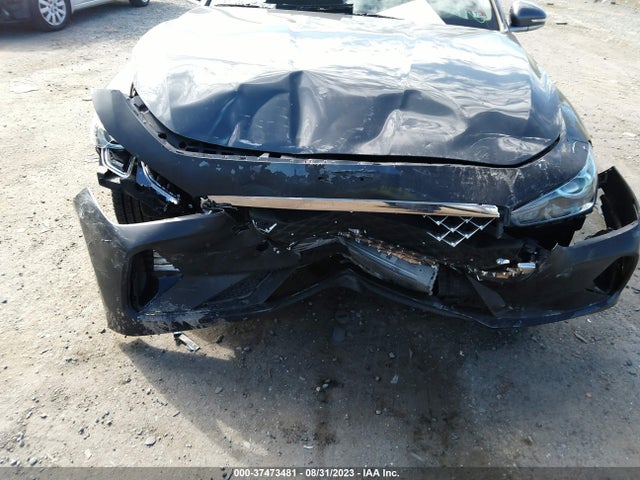 2021 GENESIS G70 3.3T AWD VIN: KMTG74LE8MU071410