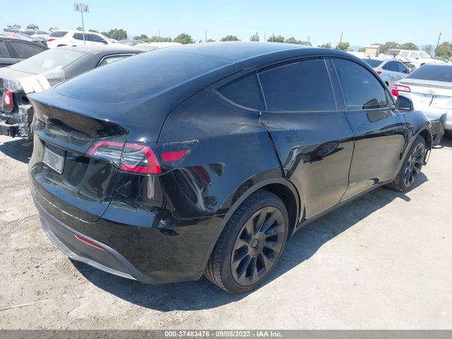Tesla Model Y Long Range 2023 7SAYGAEE5PF606028 Image 4