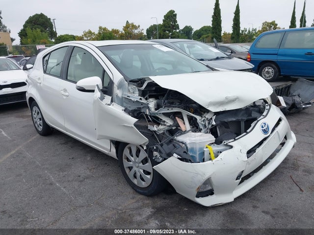 Toyota Prius C One/three/two/four 2014 JTDKDTB37E1073518 Image 1