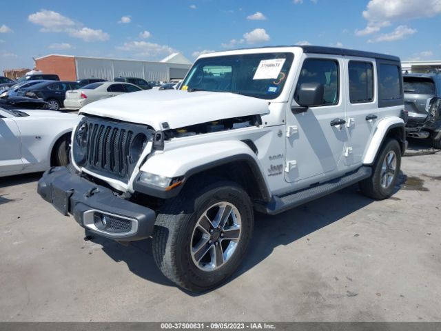 1C4HJXEG9JW116133 Jeep Wrangler Unlimited Sahara
