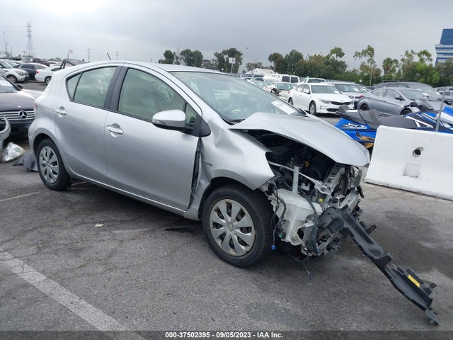 Toyota Prius C One/three/two/four 2014 JTDKDTB36E1067693 Image 1