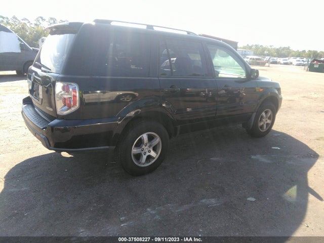 2007 HONDA PILOT EX-L VIN: 5FNYF18517B001371