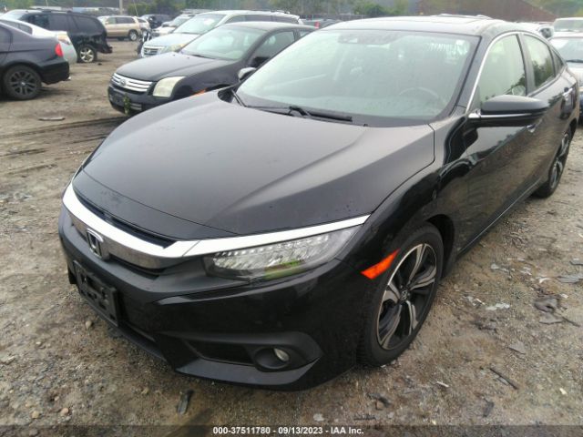 JHMFC1F95JX034214 Honda Civic Sedan Touring