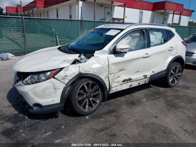 JN1BJ1CR9JW285918 Nissan Rogue Sport Sl