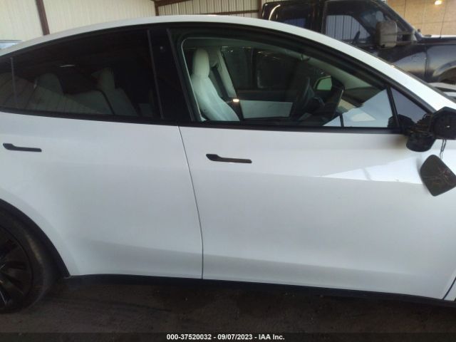 7SAYGDEF6NF410560 Tesla Model Y Performance