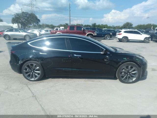 5YJ3E1EA9KF300498 Tesla Model 3 Range