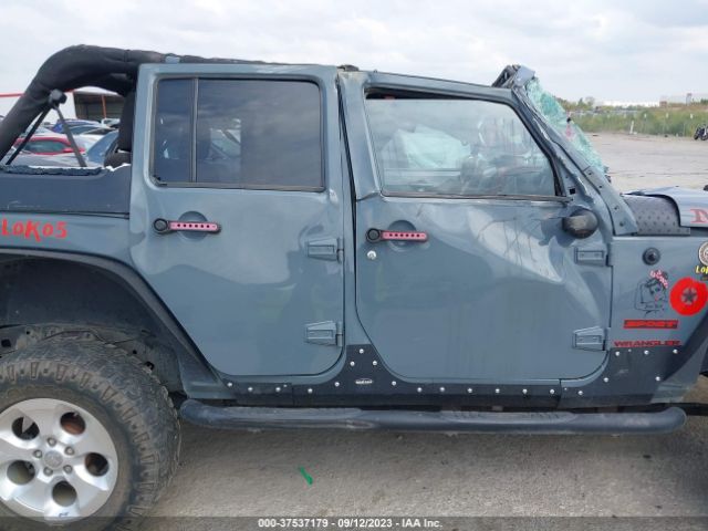 1C4BJWDG5EL305225 Jeep Wrangler Unlimited Sport