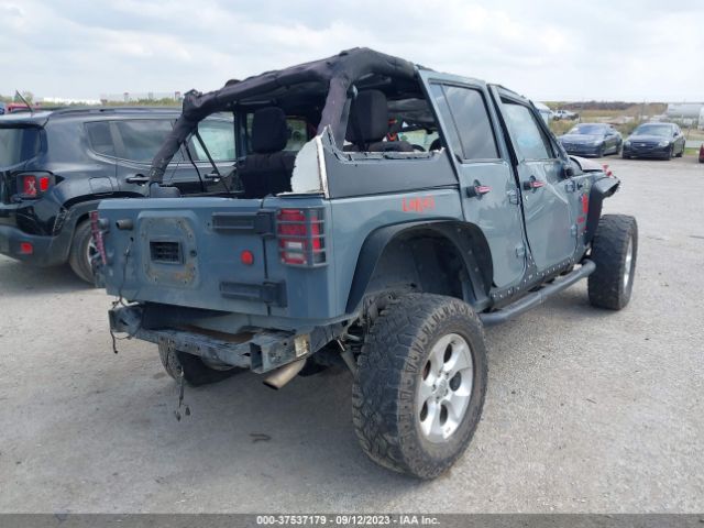 1C4BJWDG5EL305225 Jeep Wrangler Unlimited Sport