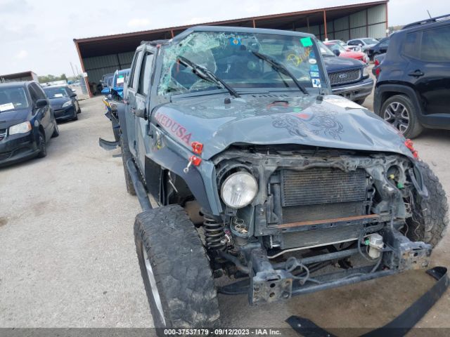 1C4BJWDG5EL305225 Jeep Wrangler Unlimited Sport