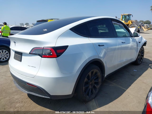 Tesla Model Y Long Range 2021 5YJYGDEE9MF087642 Image 4