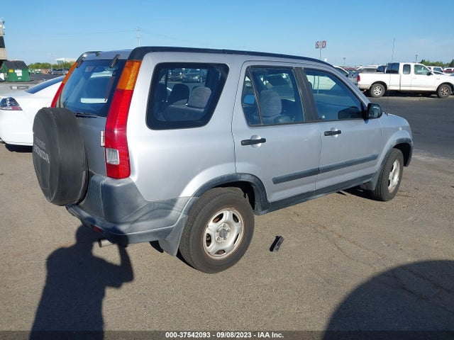 2002 HONDA CR-V LX VIN: JHLRD68552C011899
