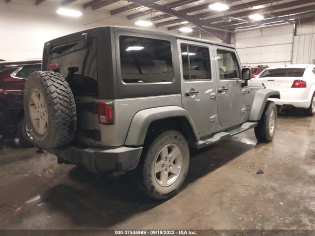 1C4BJWDG5EL251425 Jeep Wrangler Unlimited Sport