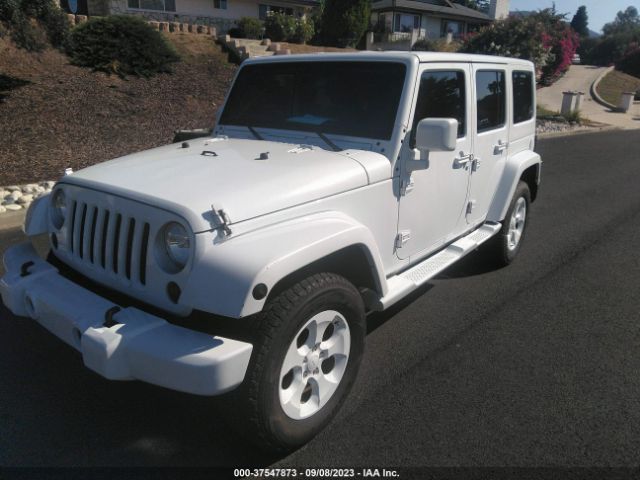 1C4BJWEG5GL333818 Jeep Wrangler Unlimited Sahara