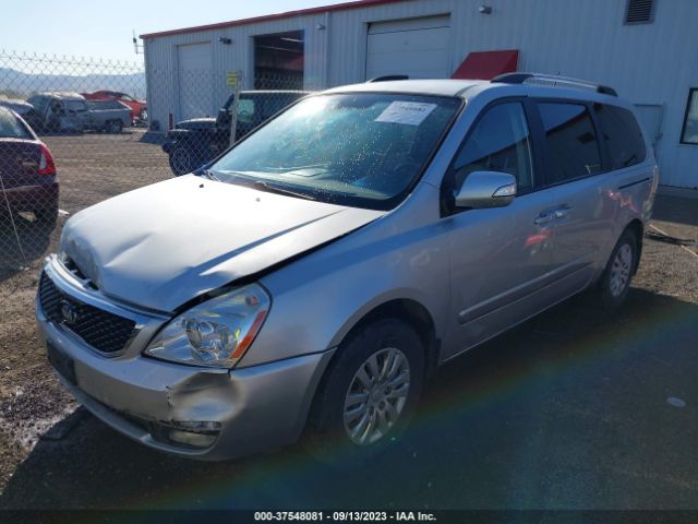 KNDMG4C72E6564668 KIA SEDONA LX