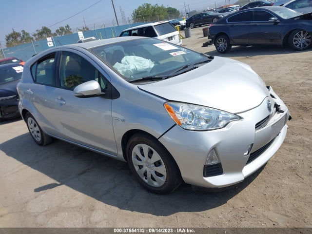 Toyota Prius C One/three/two/four 2014 JTDKDTB3XE1067325 Image 1